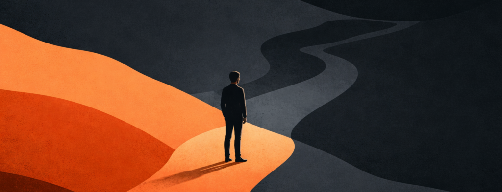 A small figure mid-journey on a winding path through layered hills